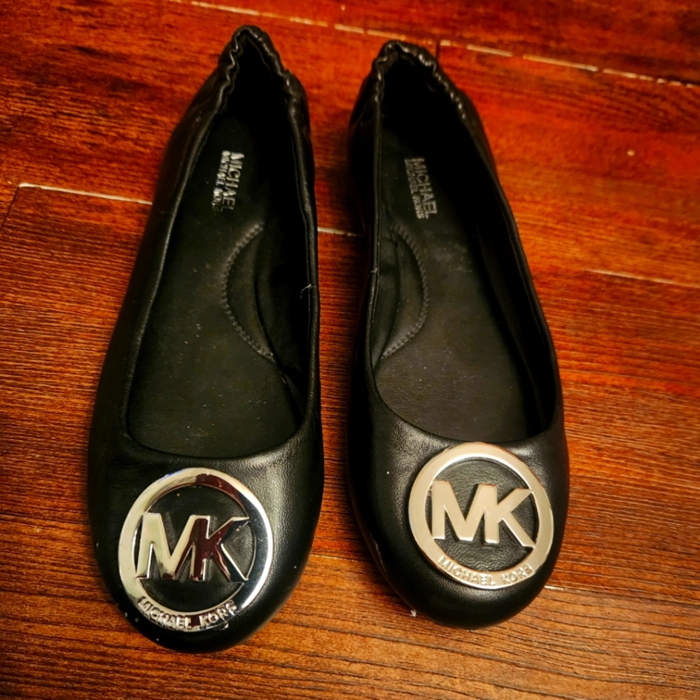 6.5 Michael Kors Black Flats with Silver Emblem